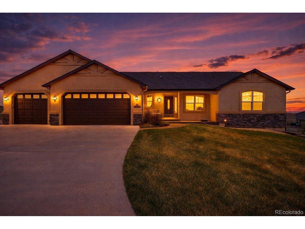 Image 2: Twilight View of Front ~ Low Maintenance Stucco and Stone Exterior Image 2: Twilight View of Front ~ Low Maintenance Stucco and Stone Exterior