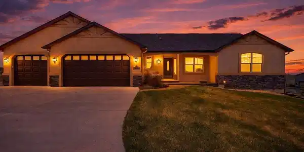 Image 2: Twilight View of Front ~ Low Maintenance Stucco and Stone Exterior Image 2: Twilight View of Front ~ Low Maintenance Stucco and Stone Exterior