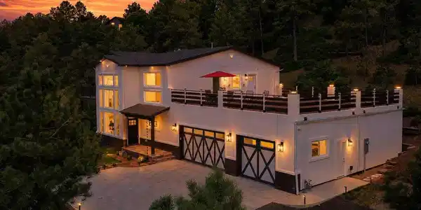Image 4: Sunset view of home with magnificent mountain, forest, & city-light views. Image 4: Sunset view of home with magnificent mountain, forest, & city-light views.