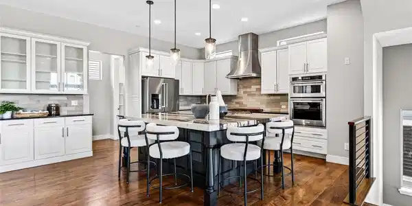 Image 3: Custom Kitchen with hickory hardwood floors, high-end appliances, and soft-close drawers and doors Image 3: Custom Kitchen with hickory hardwood floors, high-end appliances, and soft-close drawers and doors