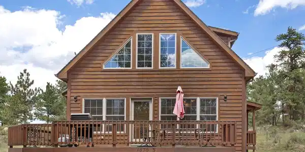 Image 3: This cabin/condo sits in the back of lot three with nothing but quiet green space behind it. Image 3: This cabin/condo sits in the back of lot three with nothing but quiet green space behind it.