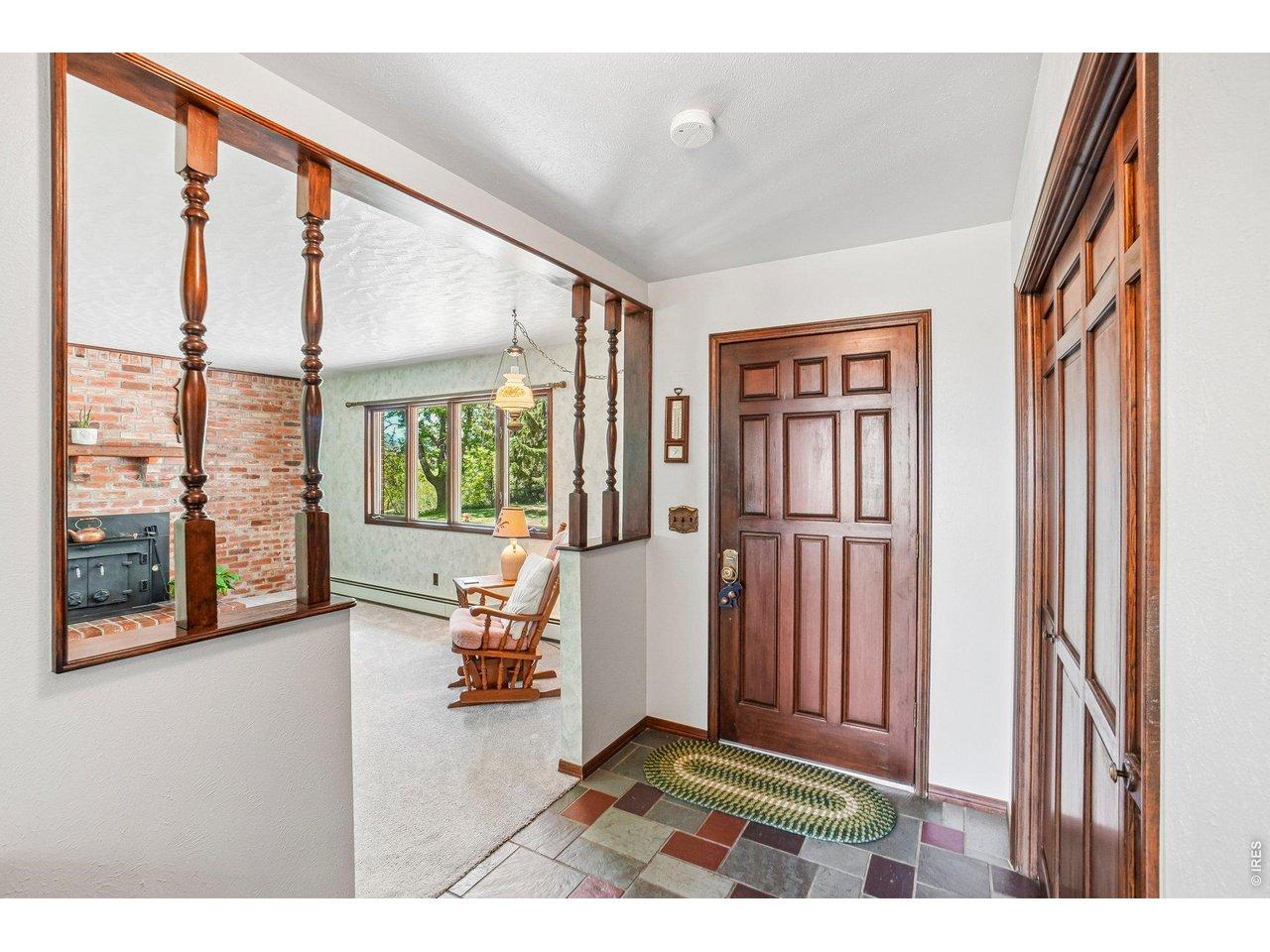 Image 4: Tile entryway with spacious cedar-lined closet Image 4: Tile entryway with spacious cedar-lined closet
