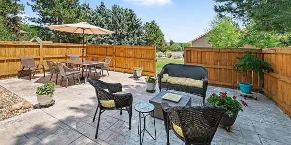 Image 4: The back patio is enclosed for privacy. Great for a party, working from home, or a homeschool outdoor classroom! Image 4: The back patio is enclosed for privacy. Great for a party, working from home, or a homeschool outdoor classroom!