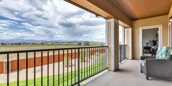Image 2: Balcony door from the Primary Suite for easy access to those mountain views morning or night!