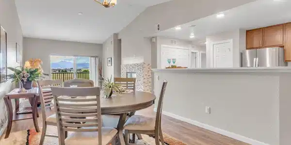 Image 4: Views for miles from the dining room through the family room out to the balcony where the mountains await!