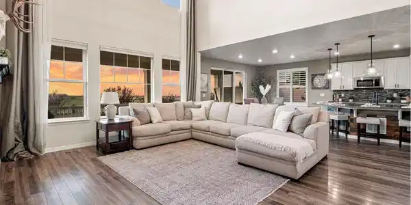 Image 4: Main family room with open concept to the kitchen and dining area. Stunning Mountain Views! Image 4: Main family room with open concept to the kitchen and dining area. Stunning Mountain Views!