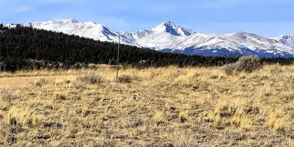 Image 2: Zoomed view southwest to snow capped mountains from inside the front of the property Image 2: Zoomed view southwest to snow capped mountains from inside the front of the property