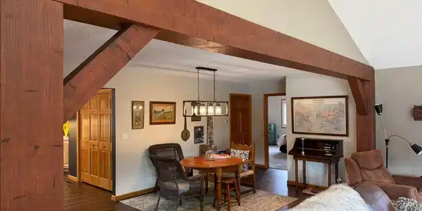 Image 3: View of Beautiful new beam in living room from the front entrance foyer