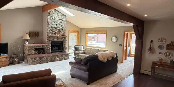 Image 4: View of living room and front door entrance