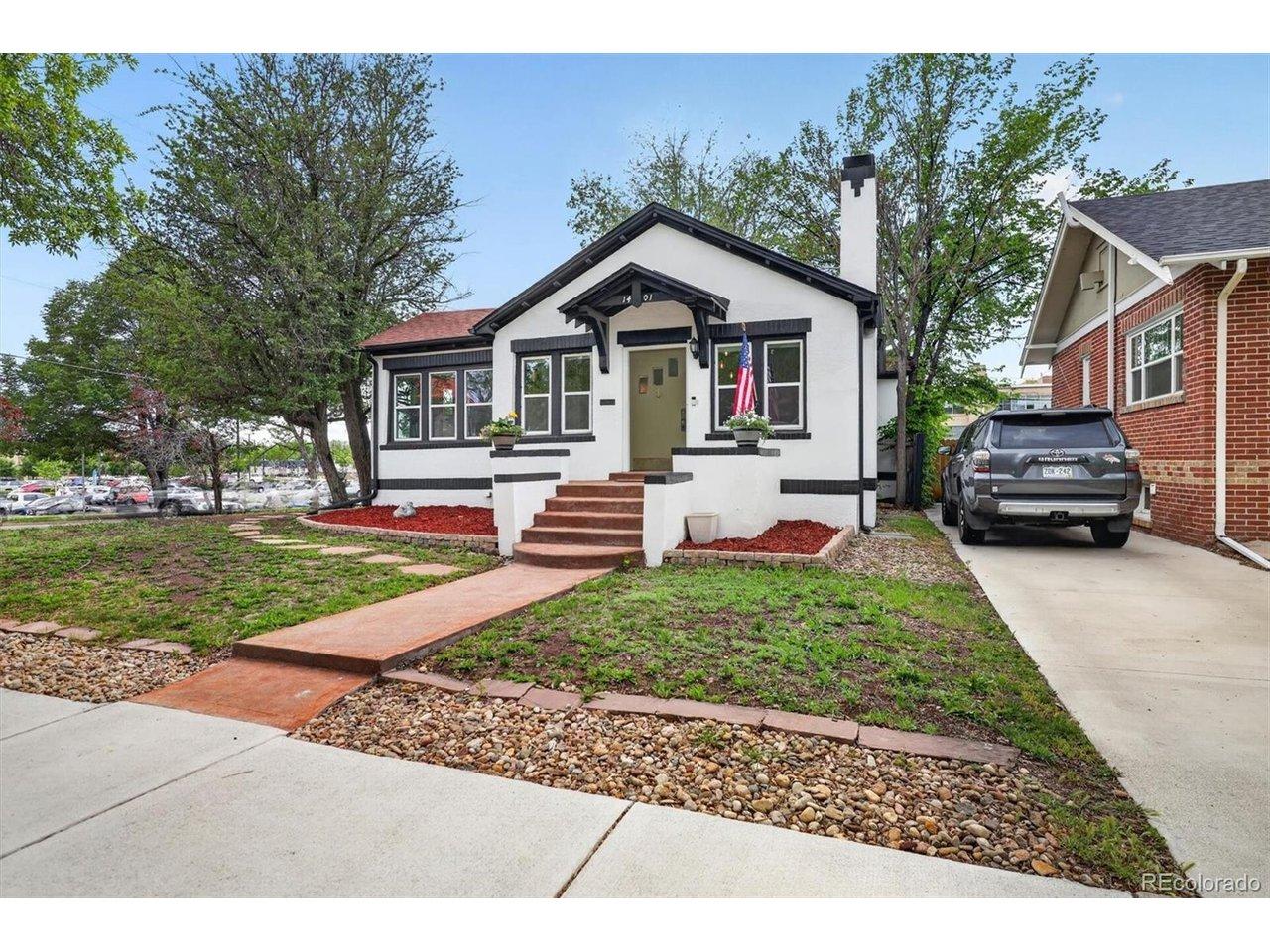 Image 3: Front of house and neighbor's driveway