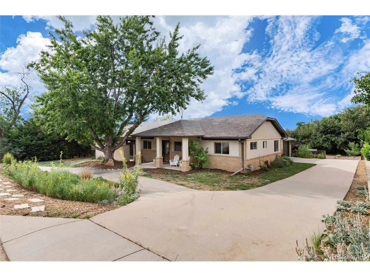 Image 1: Side load 2-car garage with workshop. Also a gravel space at the end of the driveway for an extra vehicle
