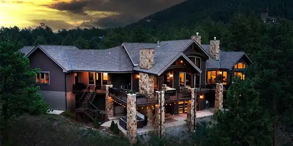 Image 2: Dusk  in Evergreen does not get better, home offers exceptional and multiple outdoor living spaces inviting the outside inside