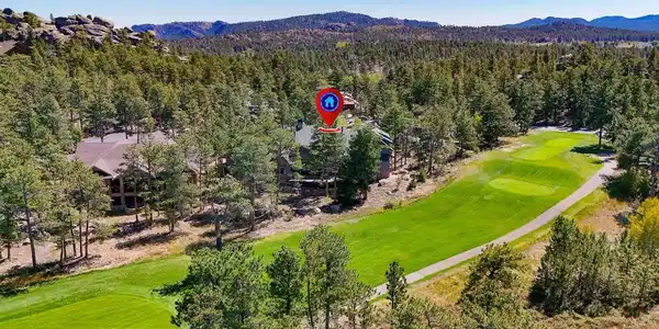 Image 2: Home is off the 14th Fairway and secluded in a rock formation and pine trees. Image 2: Home is off the 14th Fairway and secluded in a rock formation and pine trees.