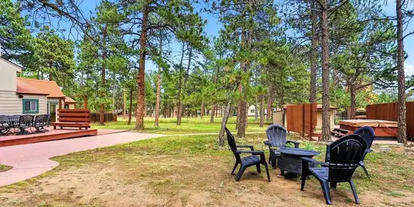 Image 3: Spacious Backyard & Fire Pit, Included with the Sale! Image 3: Spacious Backyard & Fire Pit, Included with the Sale!