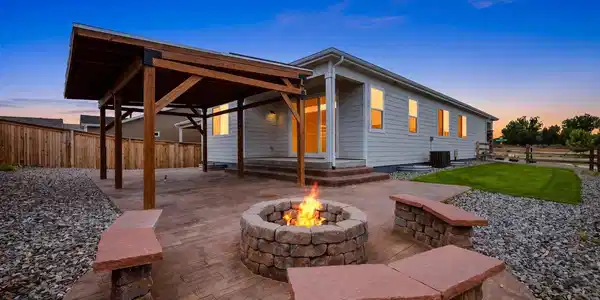 Image 4: Pergola, fire pit, color stamped concrete patio