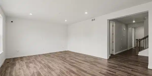 Image 3: Living Room leads to Front Entrance & NEXTGen Studio Image 3: Living Room leads to Front Entrance & NEXTGen Studio