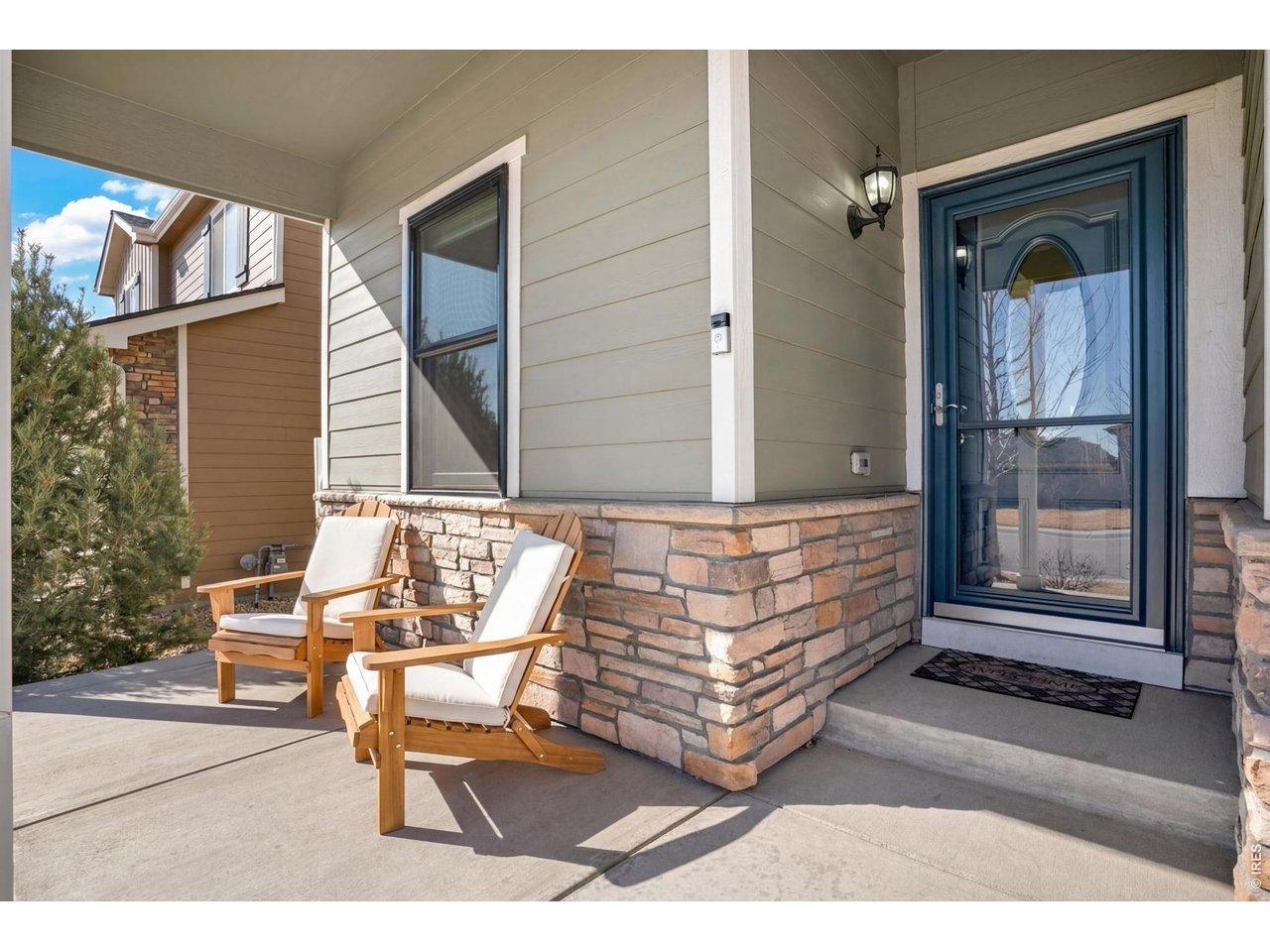 Image 2: Sunny front porch invites you to slow down and stay awhile!! It's the perfect spot to enjoy morning coffee, greet your new neighbors, or unwind in the evening! Image 2: Sunny front porch invites you to slow down and stay awhile!! It's the perfect spot to enjoy morning coffee, greet your new neighbors, or unwind in the evening!