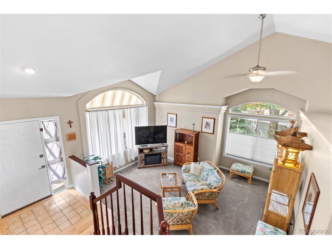 Image 4: Living room with vaulted ceilings