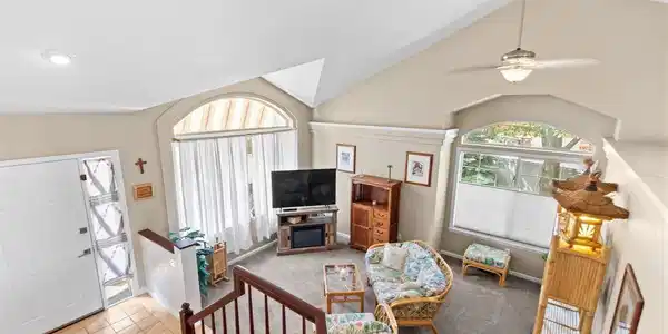 Image 4: Living room with vaulted ceilings