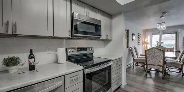 Image 4: kitchen looking to dining room
