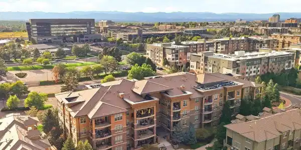 Image 2: Secure building with an elevator and mountain views.