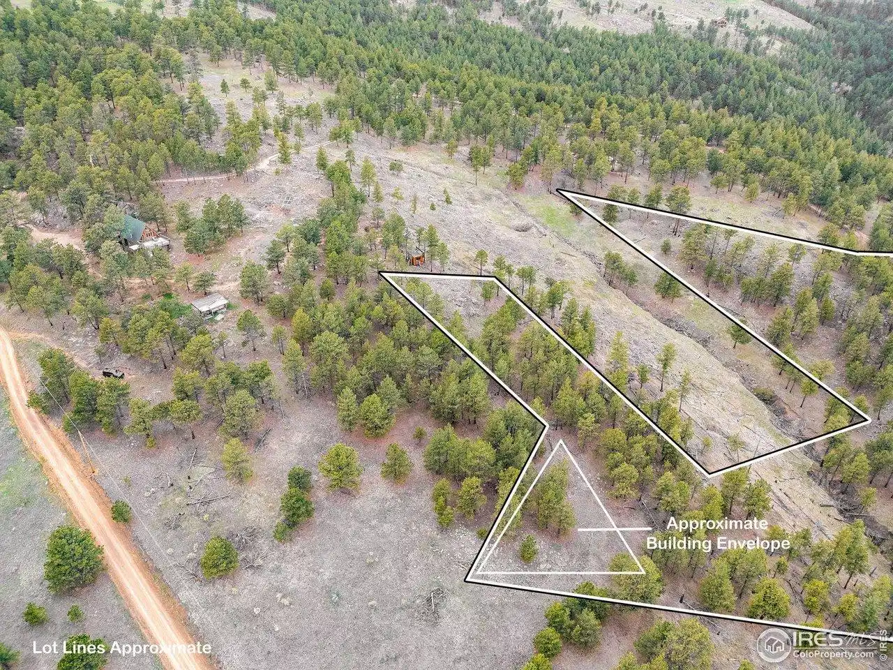 Image 1: Please be aware that any land and/or structures shown in the listing photos outside of the approximate lot lines are not  for sale.