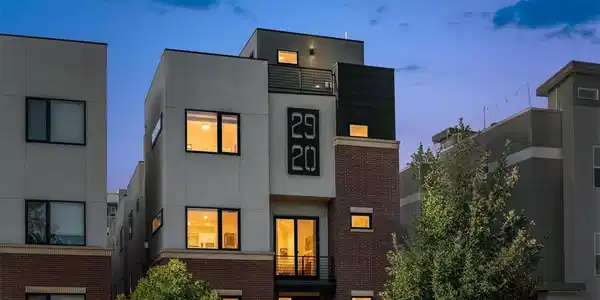 Image 2: Contemporary Jefferson Park townhome at twilight Image 2: Contemporary Jefferson Park townhome at twilight