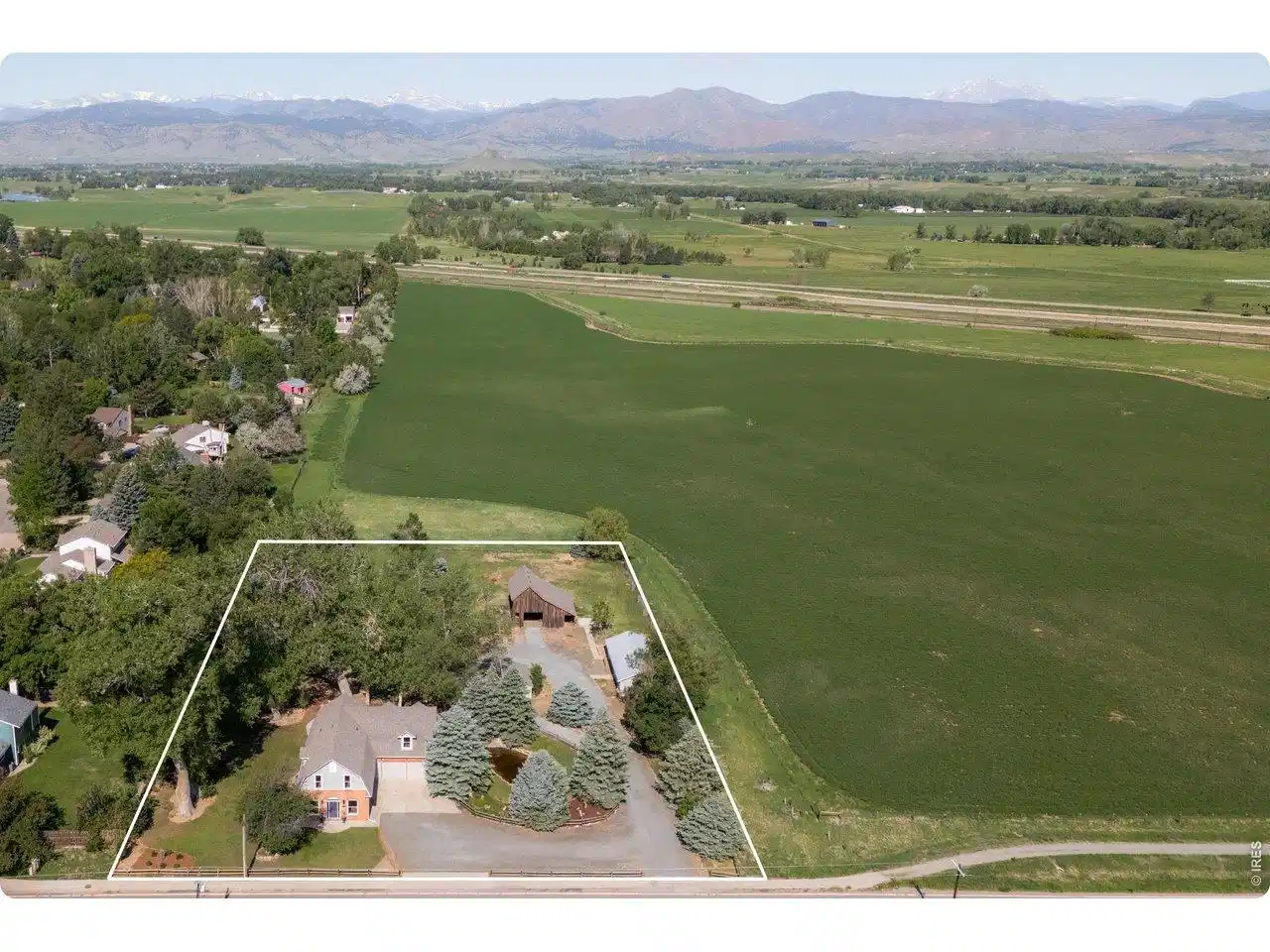 Image 1: Aerial view of the property and the open space and views. Image 1: Aerial view of the property and the open space and views.