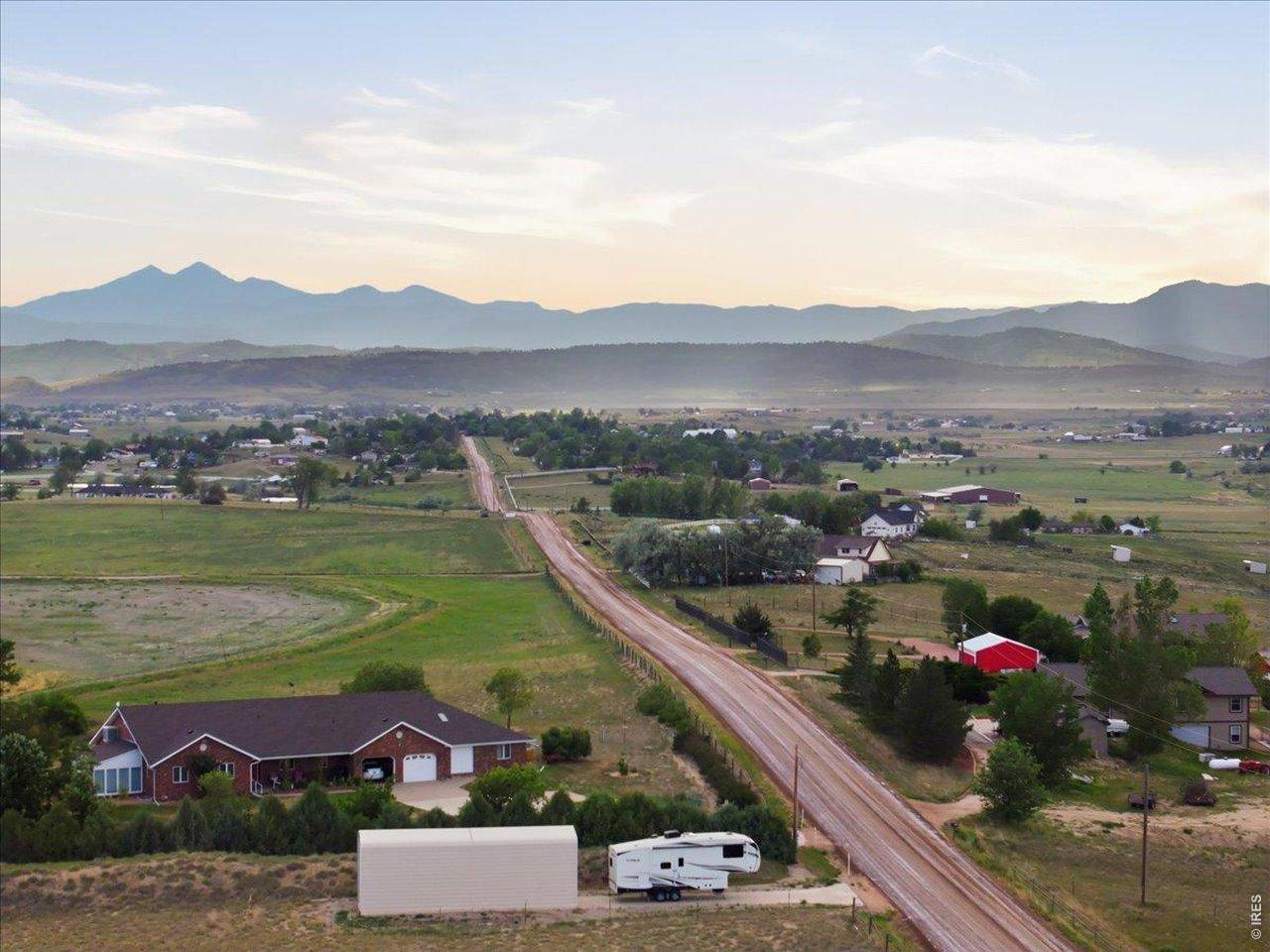 Image 2: Home on the right with red barn Image 2: Home on the right with red barn
