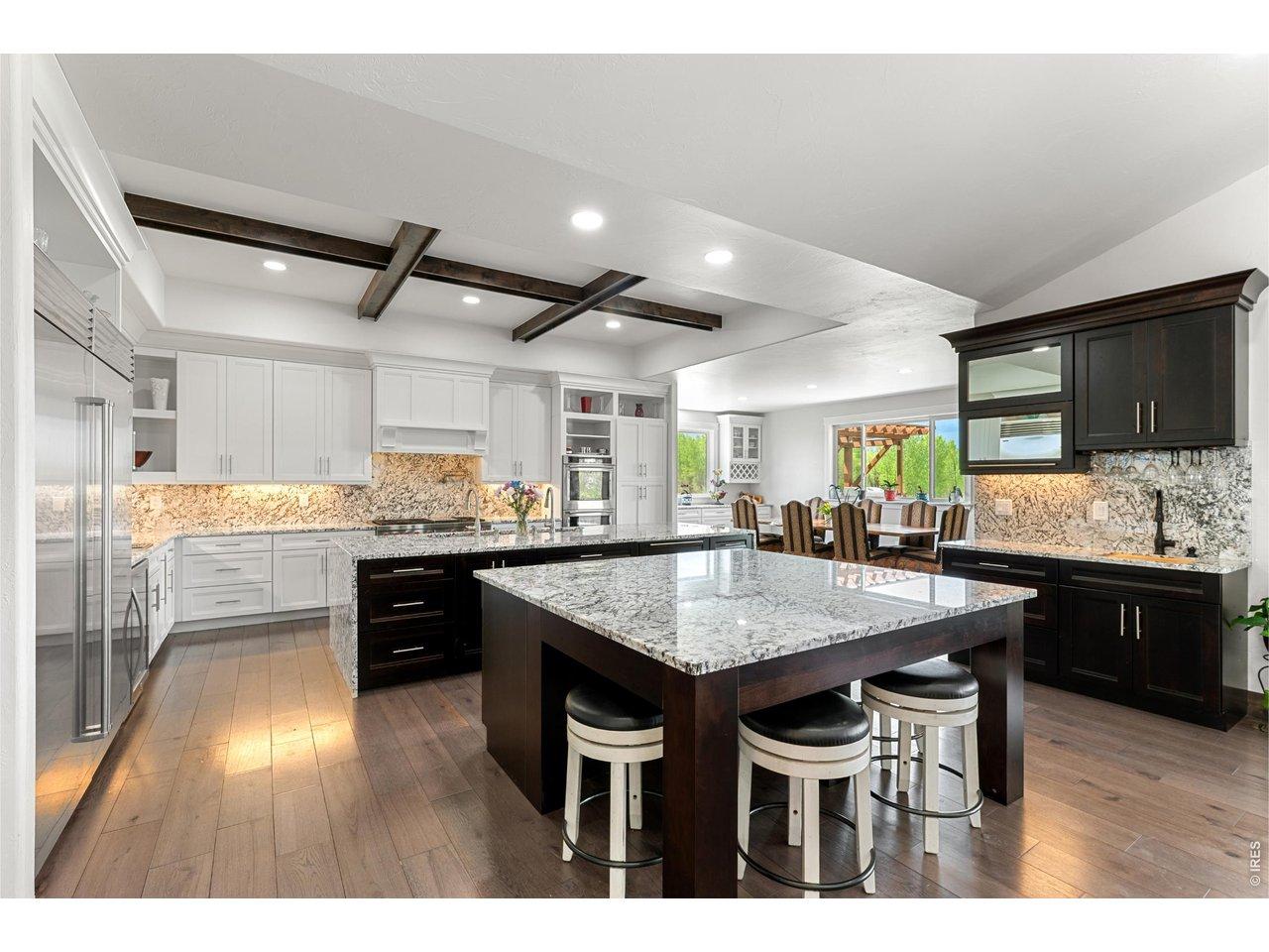 Image 4: Gourmet chef's kitchen with double island