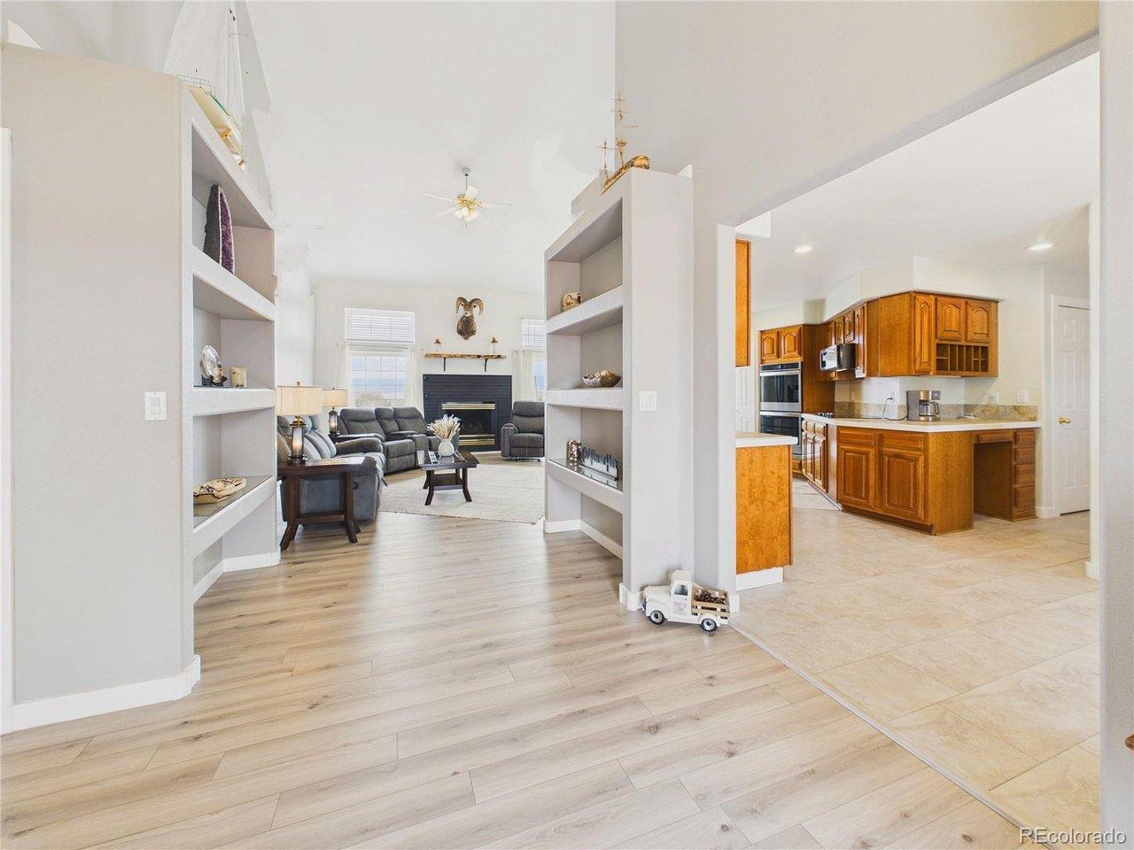 Image 4: Thoughtfully designed layout flows seamlessly from the living room into the kitchen, ideal for everyday living and entertaining. Image 4: Thoughtfully designed layout flows seamlessly from the living room into the kitchen, ideal for everyday living and entertaining.