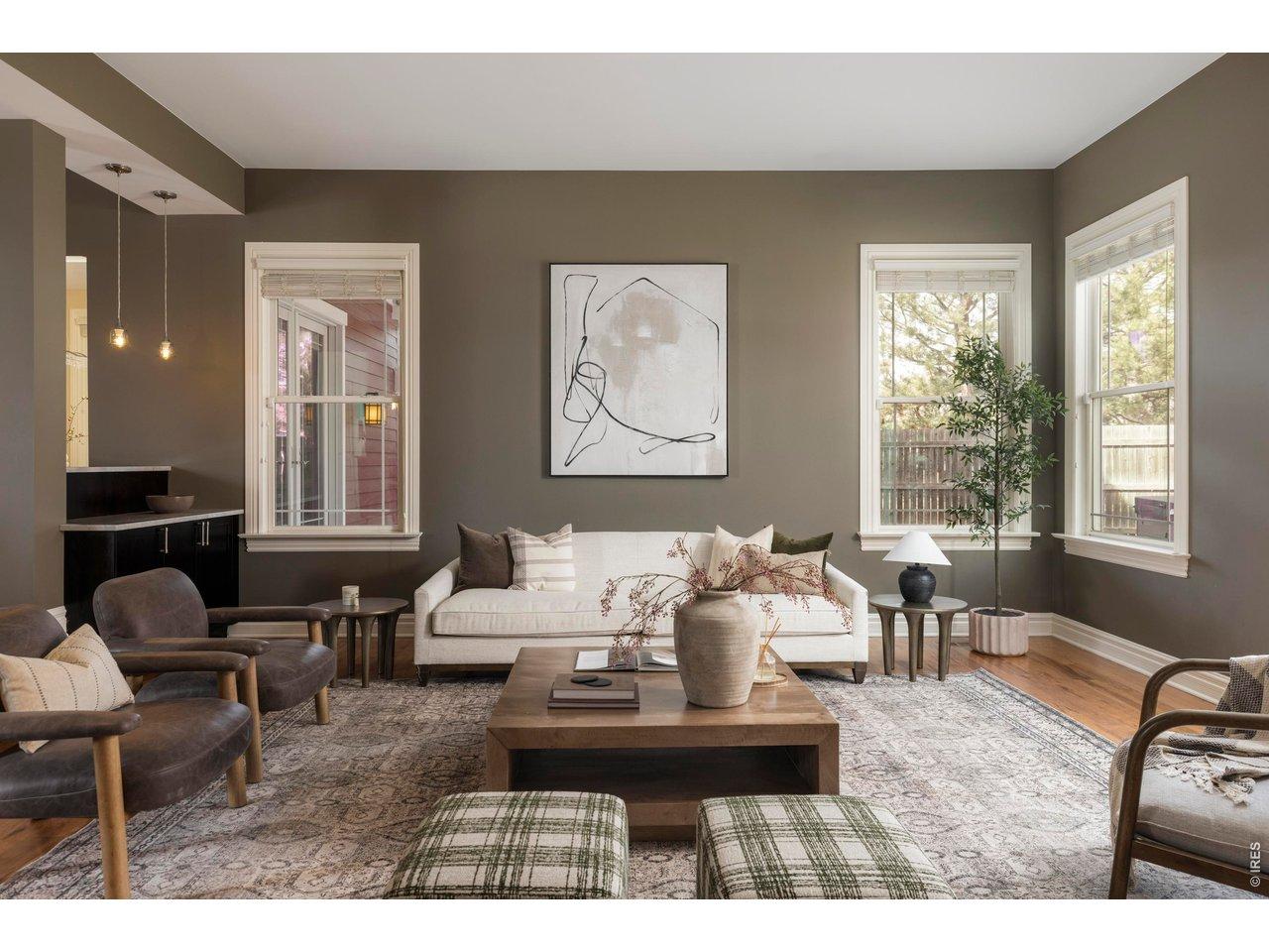 Image 3: Continue through the main level and the home opens into a beautifully connected living space where the family room, dining area, and kitchen flow together while still feeling distinct, creating an ideal layout for both entertaining and daily life. Image 3: Continue through the main level and the home opens into a beautifully connected living space where the family room, dining area, and kitchen flow together while still feeling distinct, creating an ideal layout for both entertaining and daily life.