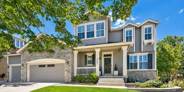 Image 3: Beautiful curb appeal with stone accents, mature landscaping and a welcoming covered front porch. Image 3: Beautiful curb appeal with stone accents, mature landscaping and a welcoming covered front porch.