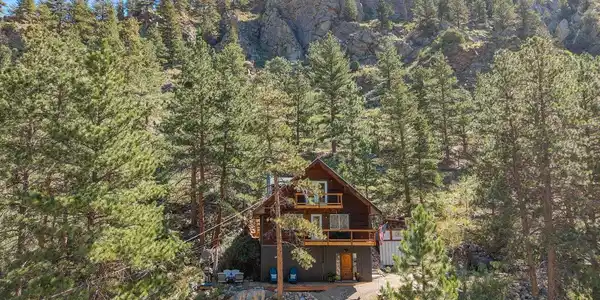 Image 2: Surrounded by the natural beauty of the Big Thompson Canyon and backing to Roosevelt National Forest. Image 2: Surrounded by the natural beauty of the Big Thompson Canyon and backing to Roosevelt National Forest.