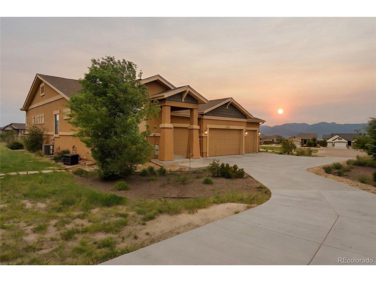 Image 2: Front of house at sunset Image 2: Front of house at sunset