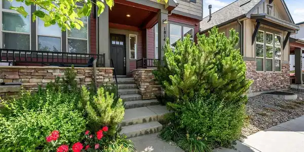 Image 2: Welcoming Entry with large front porch
