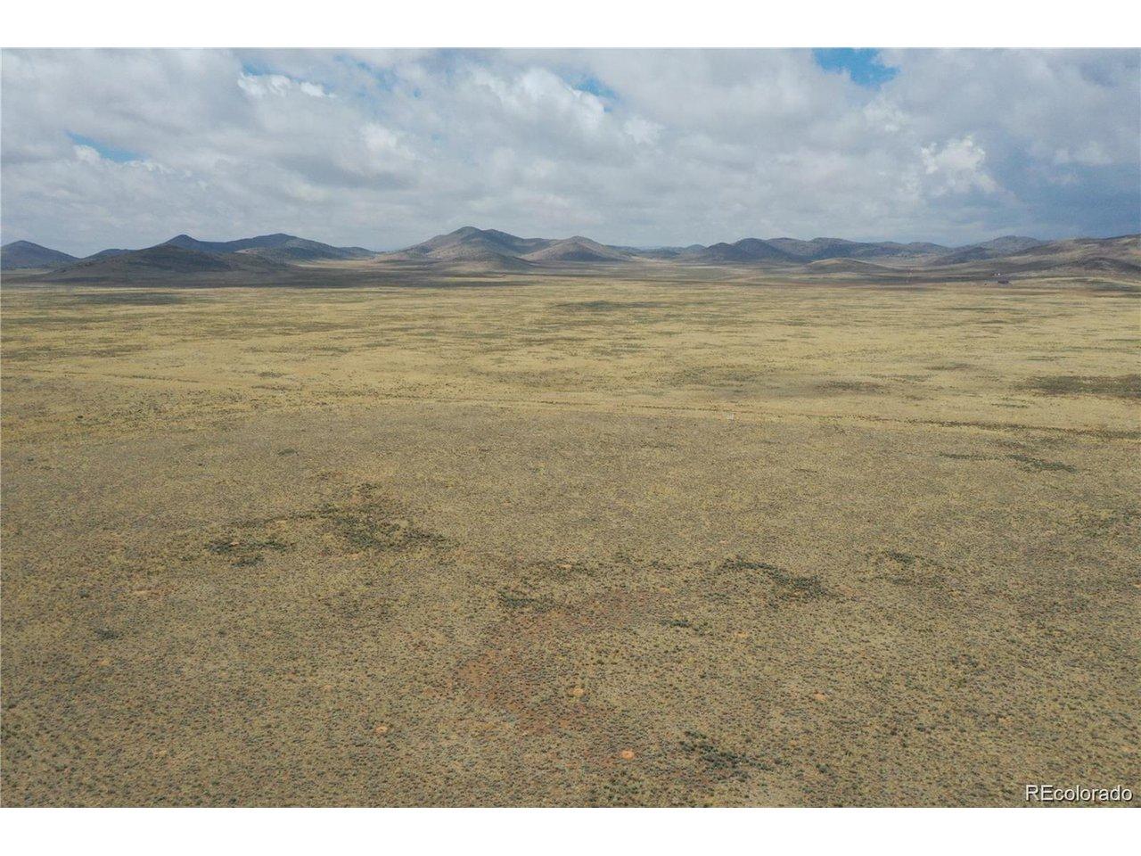 Image 2: Aerial shots display mountain range, level ground, and ready to build on. Image 2: Aerial shots display mountain range, level ground, and ready to build on.