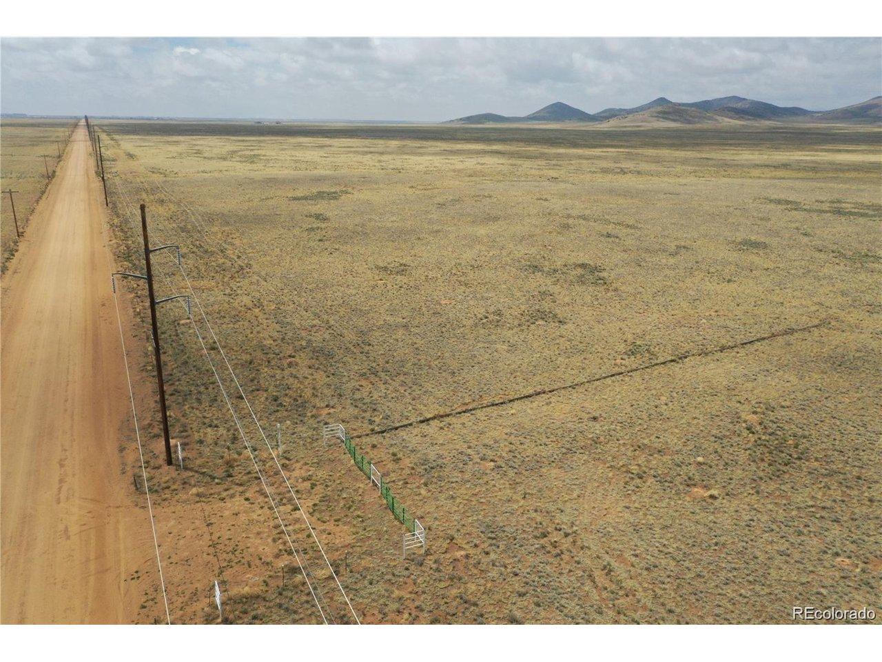 Image 4: Entrance - Electrical power lines run along CR 12. Power is ready and available for your new build site. Image 4: Entrance - Electrical power lines run along CR 12. Power is ready and available for your new build site.