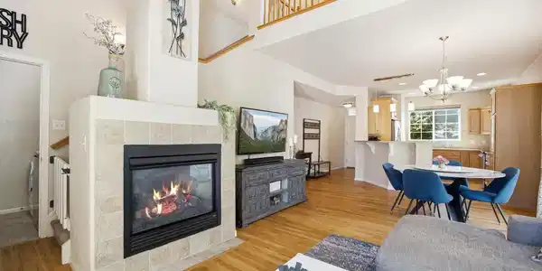 Image 3: Open living room with fireplace