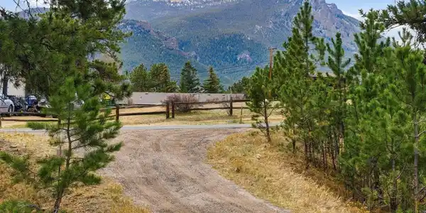 Image 4: Looking back up the driveway to Twin Sisters Peak Image 4: Looking back up the driveway to Twin Sisters Peak