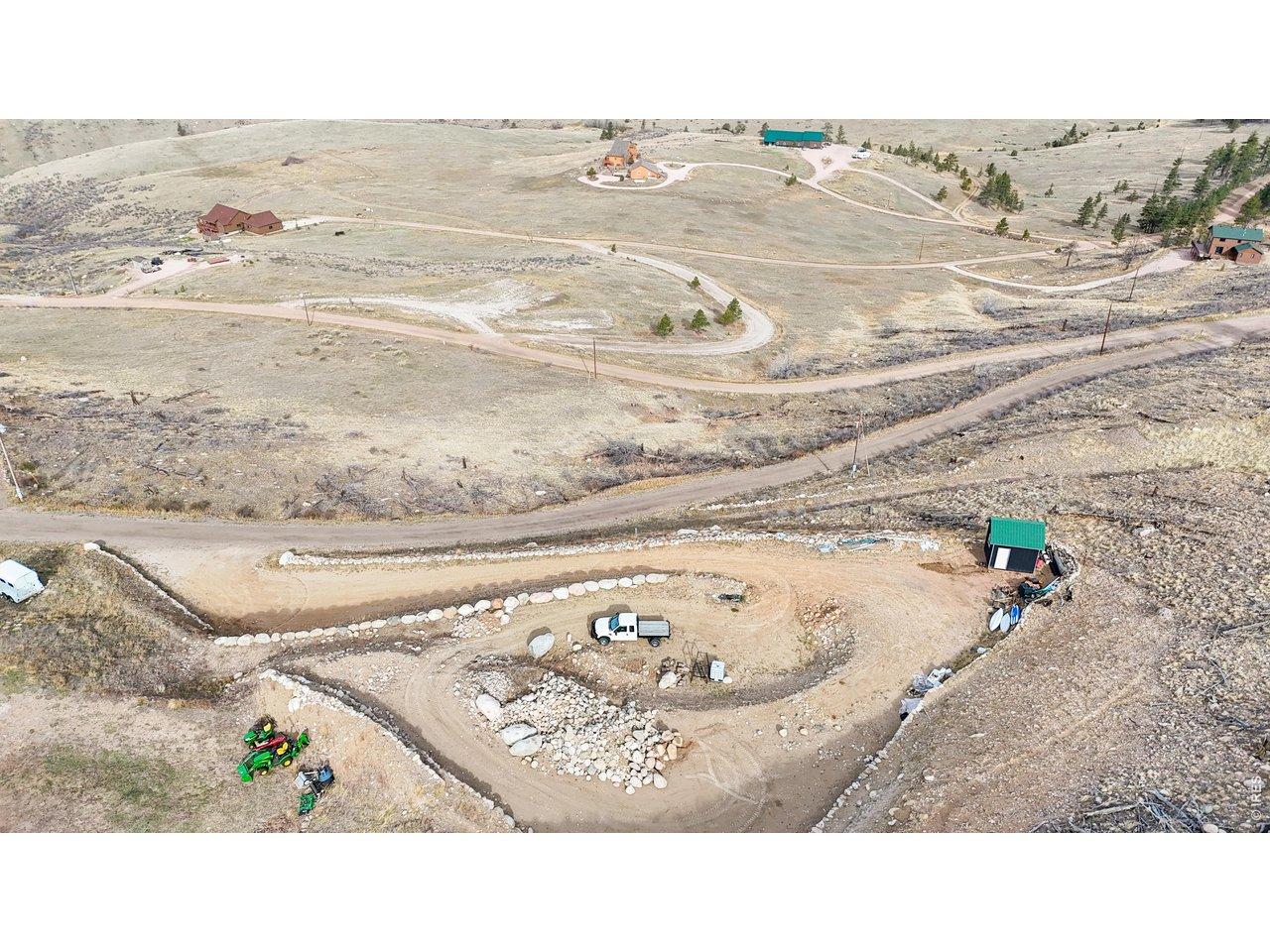 Image 4: Elevated homesite with excavated foundation area and sweeping mountain views Image 4: Elevated homesite with excavated foundation area and sweeping mountain views