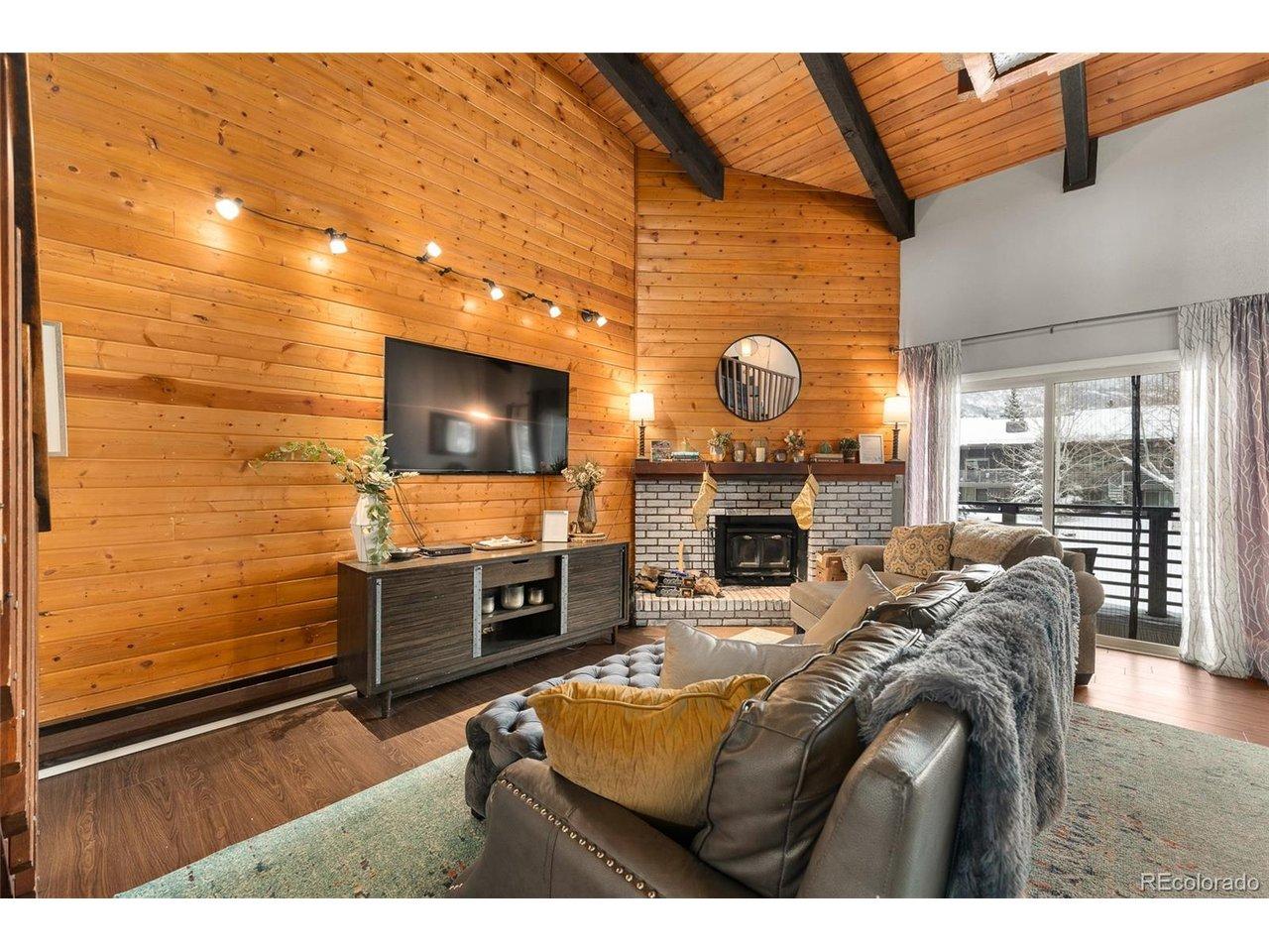 Image 3: Wood burning fireplace.