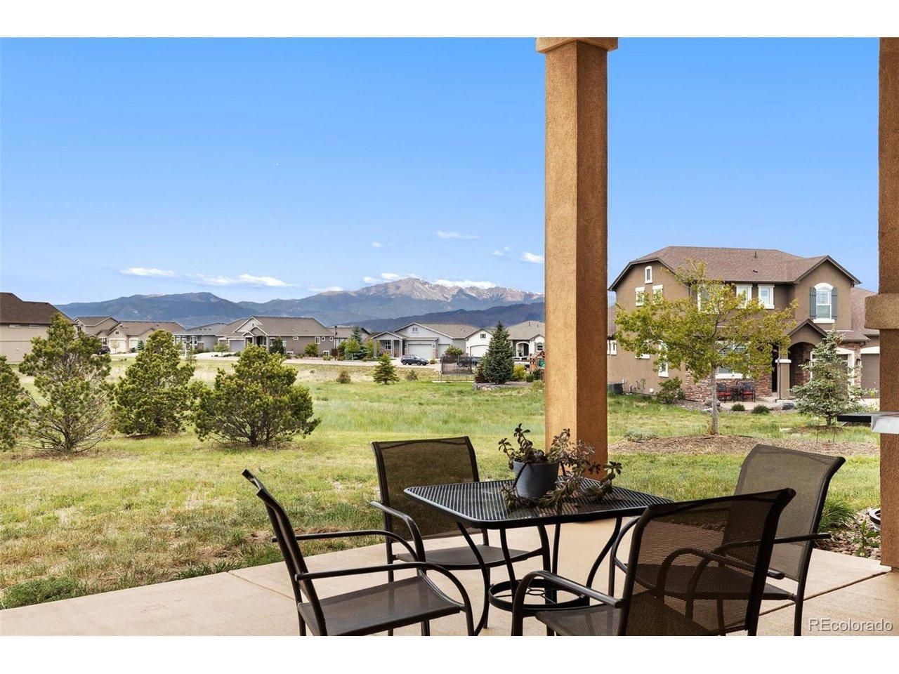 Image 4: Gorgeous view of Pikes Peak from covered patio Image 4: Gorgeous view of Pikes Peak from covered patio