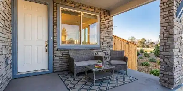 Image 2: Front porch overlooking greenspace and views Image 2: Front porch overlooking greenspace and views