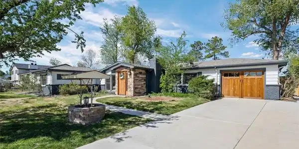 Image 3: Nice long driveway that continues down backside of house to detached garage Image 3: Nice long driveway that continues down backside of house to detached garage