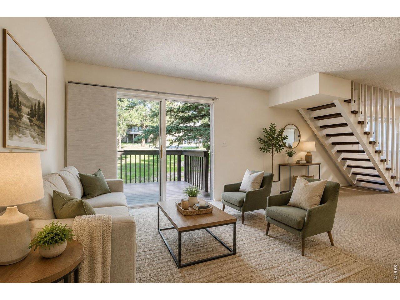 Image 1: Main-level living room featuring new paint, new carpeting, and access to your private deck. (Some photos are virtually staged to show potential use of space) Image 1: Main-level living room featuring new paint, new carpeting, and access to your private deck. (Some photos are virtually staged to show potential use of space)