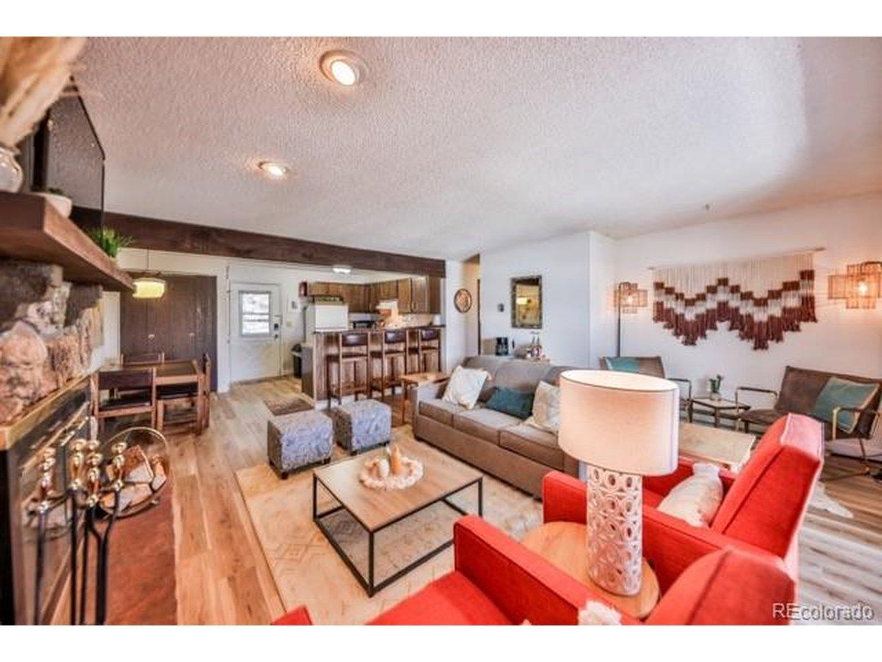 Image 4: Open layout from living room to kitchen Image 4: Open layout from living room to kitchen