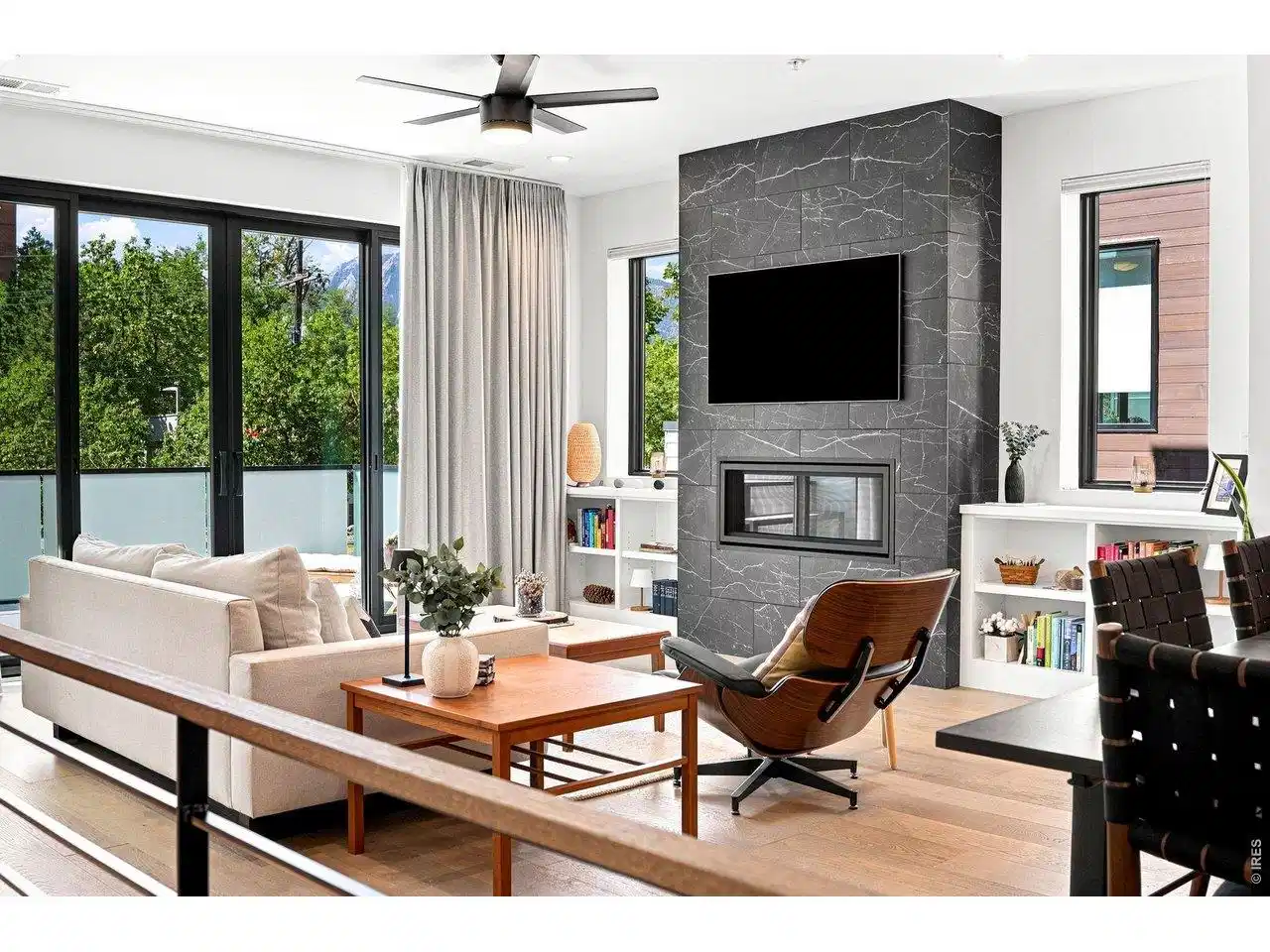 Image 1: Cozy meets contemporary, floor-to-ceiling marble surround, custom built-ins & gorgeous mountain views Image 1: Cozy meets contemporary, floor-to-ceiling marble surround, custom built-ins & gorgeous mountain views