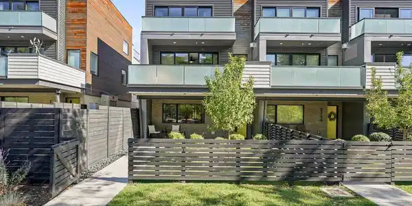 Image 4: Sleek from every angle this Walnut Crossing end-unit townhome makes a statement day or night. Image 4: Sleek from every angle this Walnut Crossing end-unit townhome makes a statement day or night.