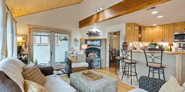 Image 4: Gas Fireplace and kitchen bar seating